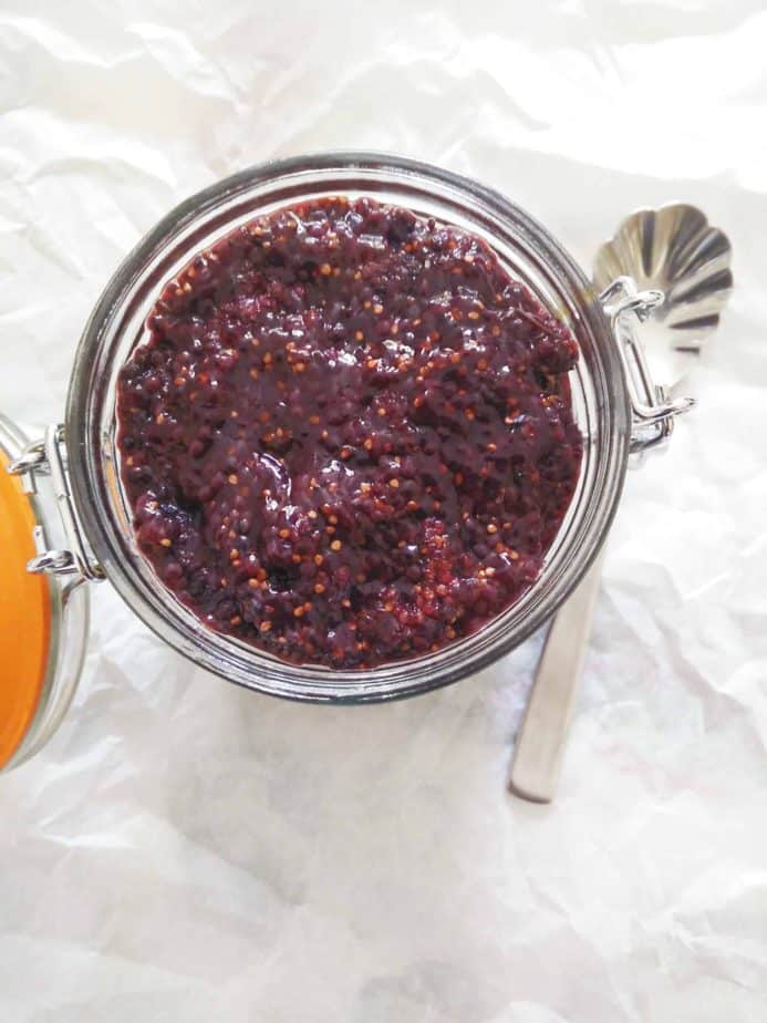 Top of a mulberry jam in a glass jar