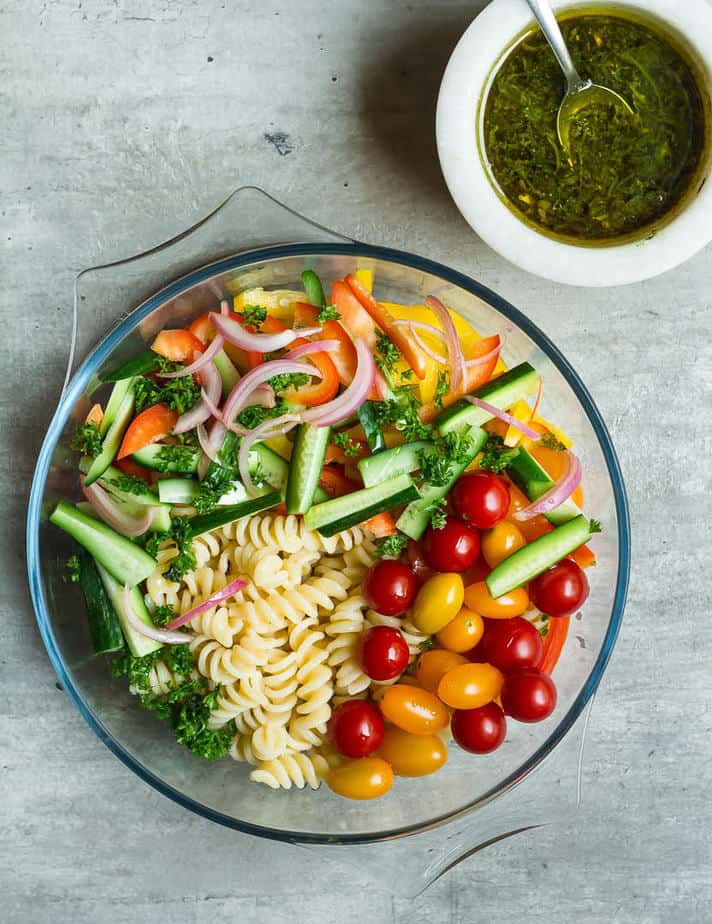 Ready to mix the Summer Pasta Salad w/ Balsamic Vinaigrette | Easy vegan pasta salad recipe