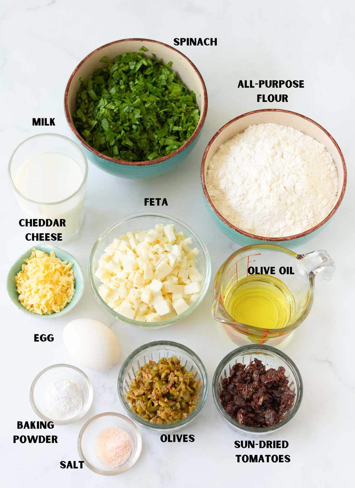 Ingredients for making feta spinach muffins.