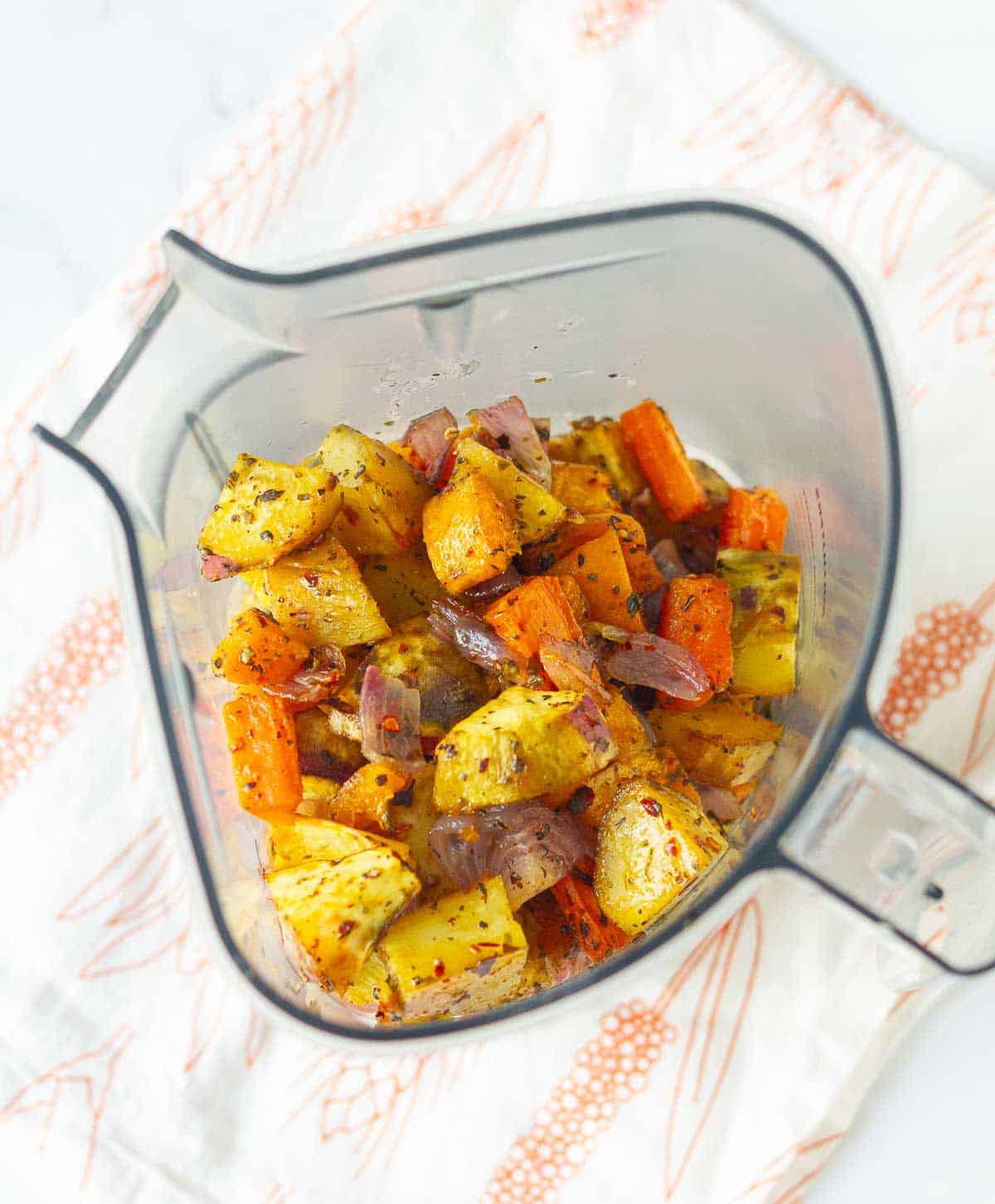roasted vegetables in a blender jar.