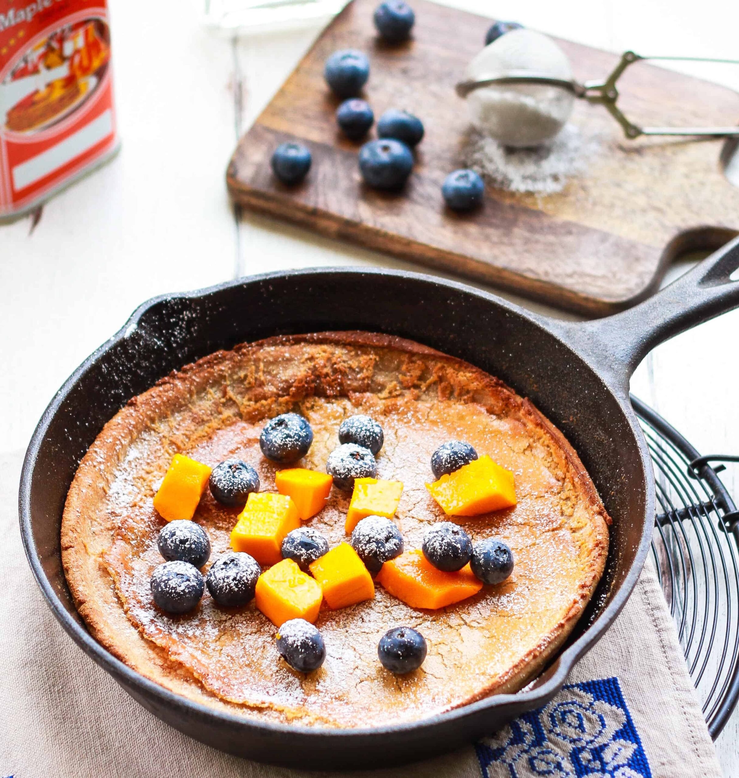 Dutch Baby pancake in a cast iron skillet.