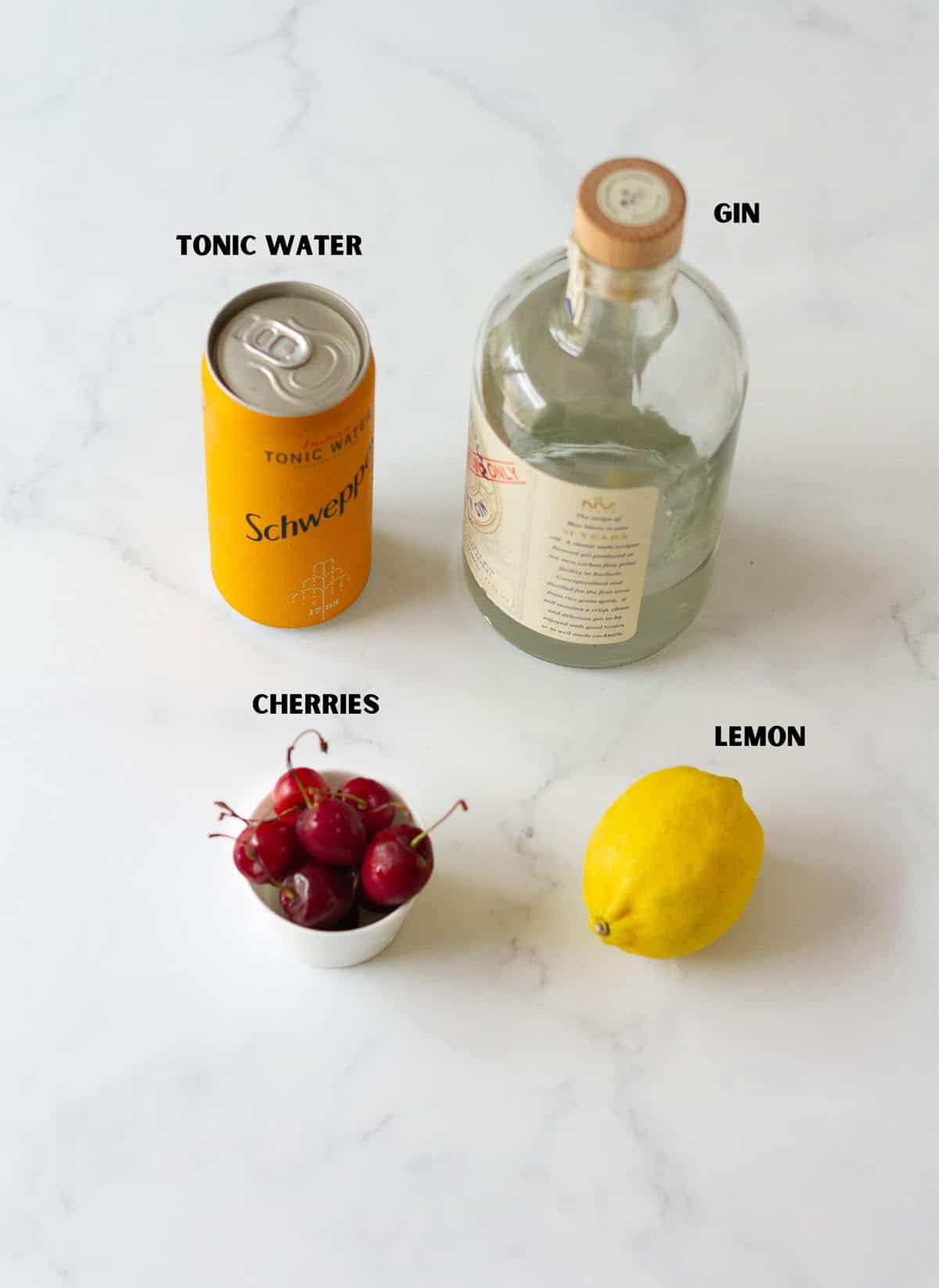 Ingredients for making cherry gin and tonic.