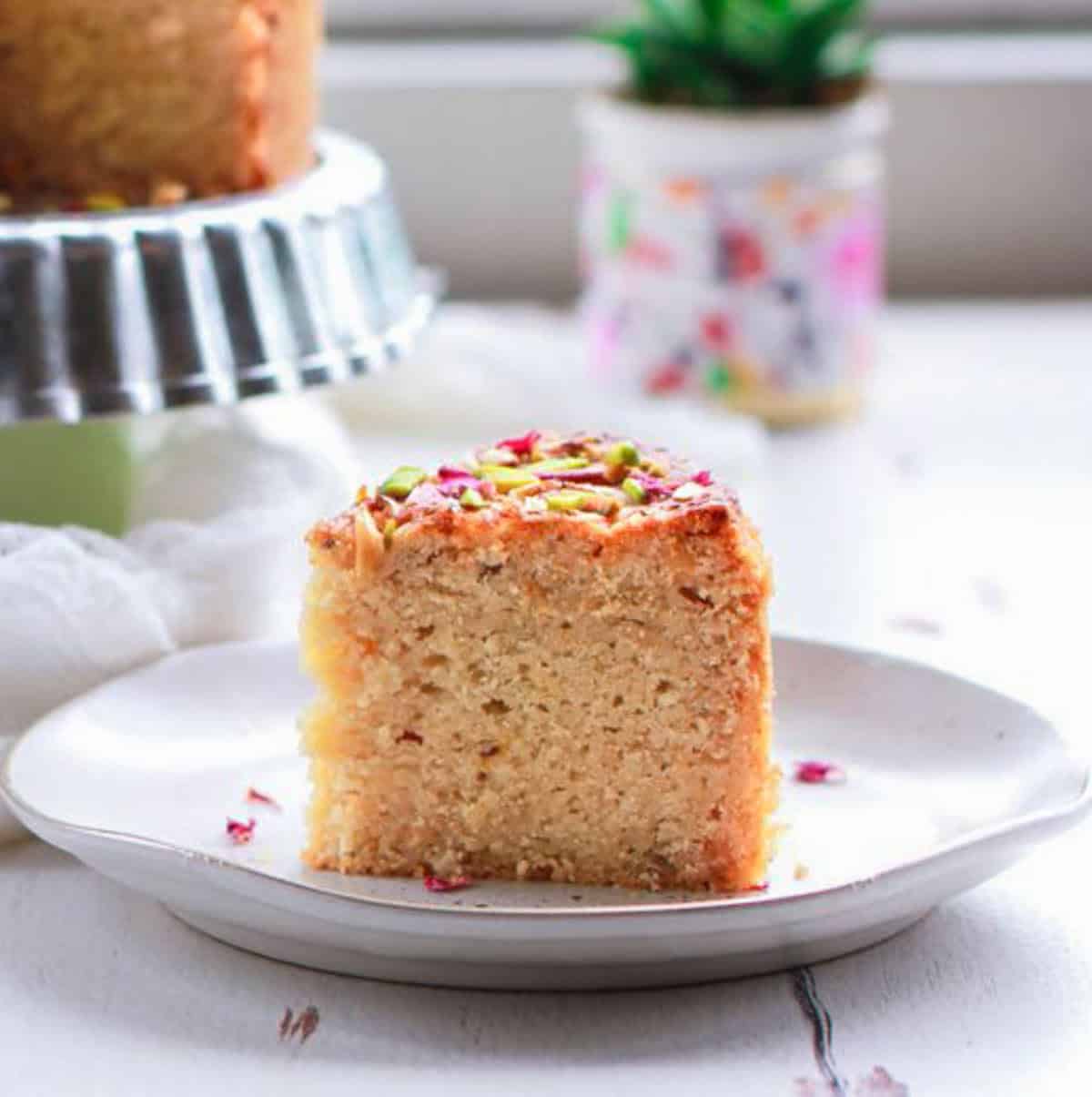 A slice of cake on a small plate.