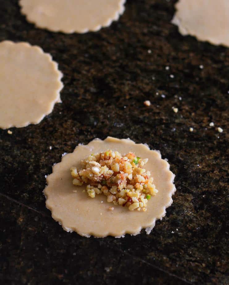 Rolled out disc with filling | Gujiya | Baked Mawa Gujiya