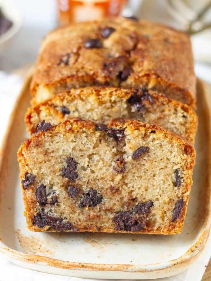 Sliced chocolate chip cake on a platter.