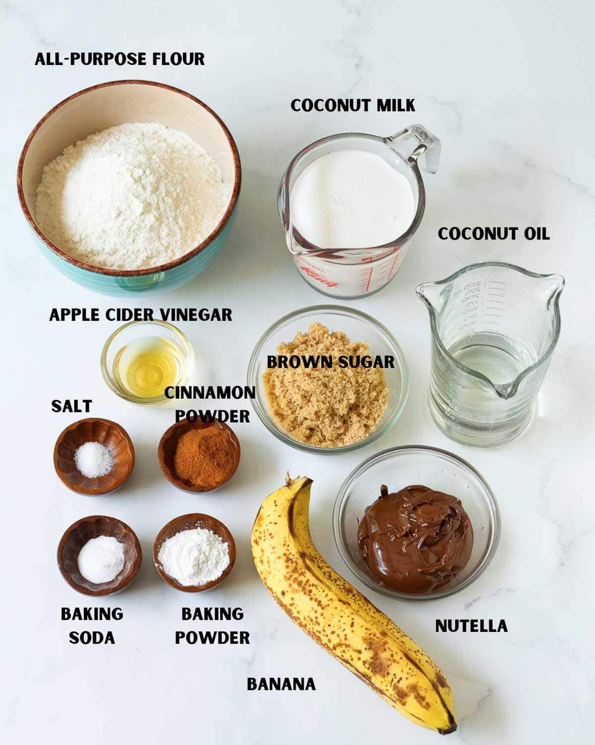 Labelled ingredients for making nutella banana muffins.