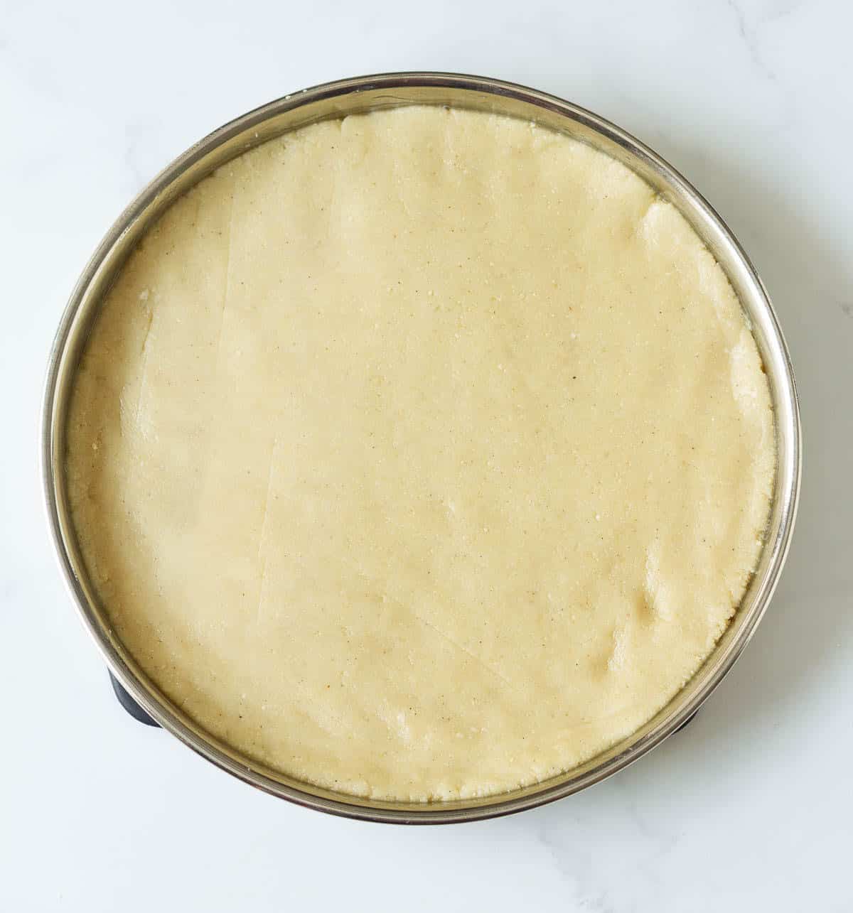 Kaju burfi dough on a plate.