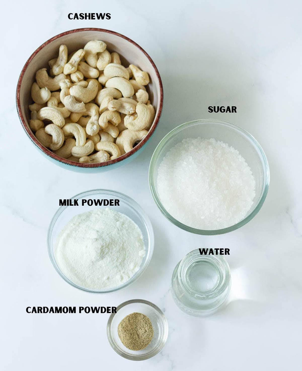 Labelled ingredients for making kaju katli.