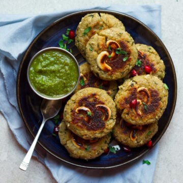 Sweet Potato Millet Cutlets with mint chutney on a plate.