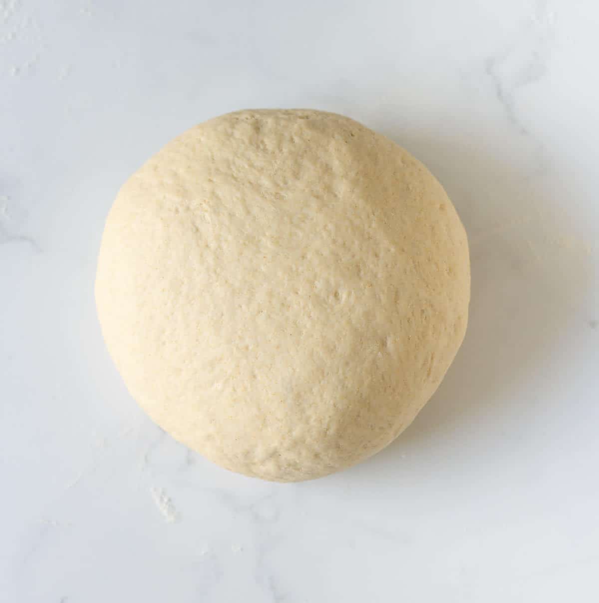 Dough shaped into a ball.