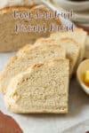 Sliced bread on parchment paper.