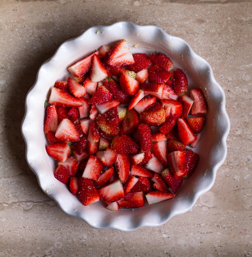Prepped strawberries forStrawberry Dump Cake | Easy eggless strawberry cake recipe