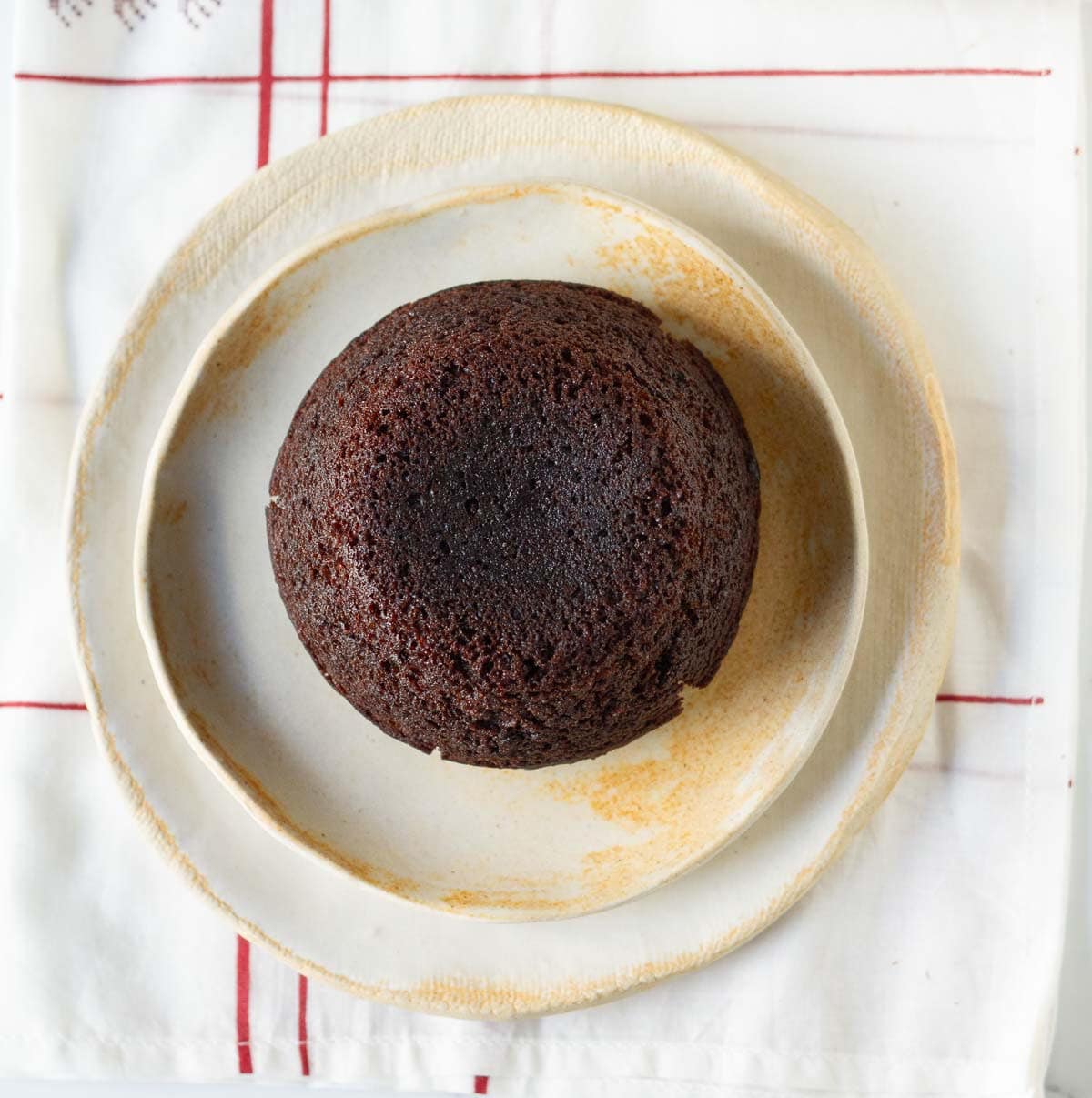 Chocolate cake on a small plate.