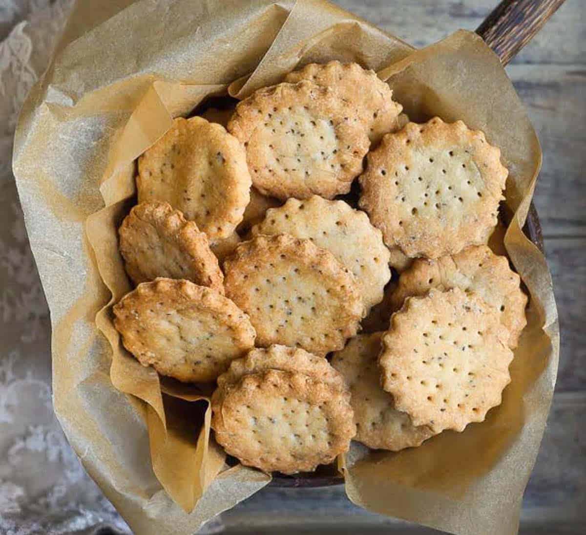 Baked mathris in a parchment paper lined bowl.