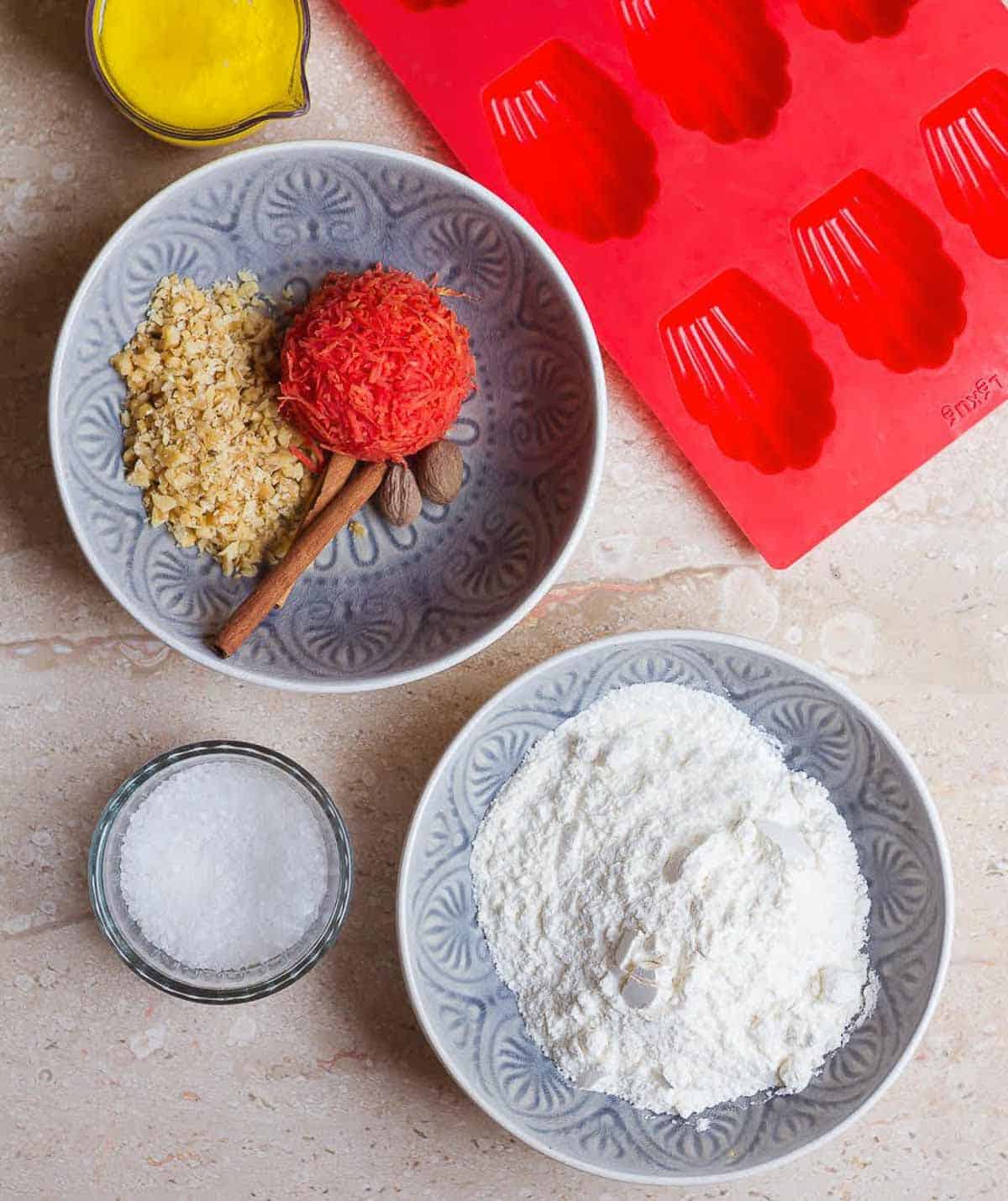 Ingredients for making carrot madeleines.