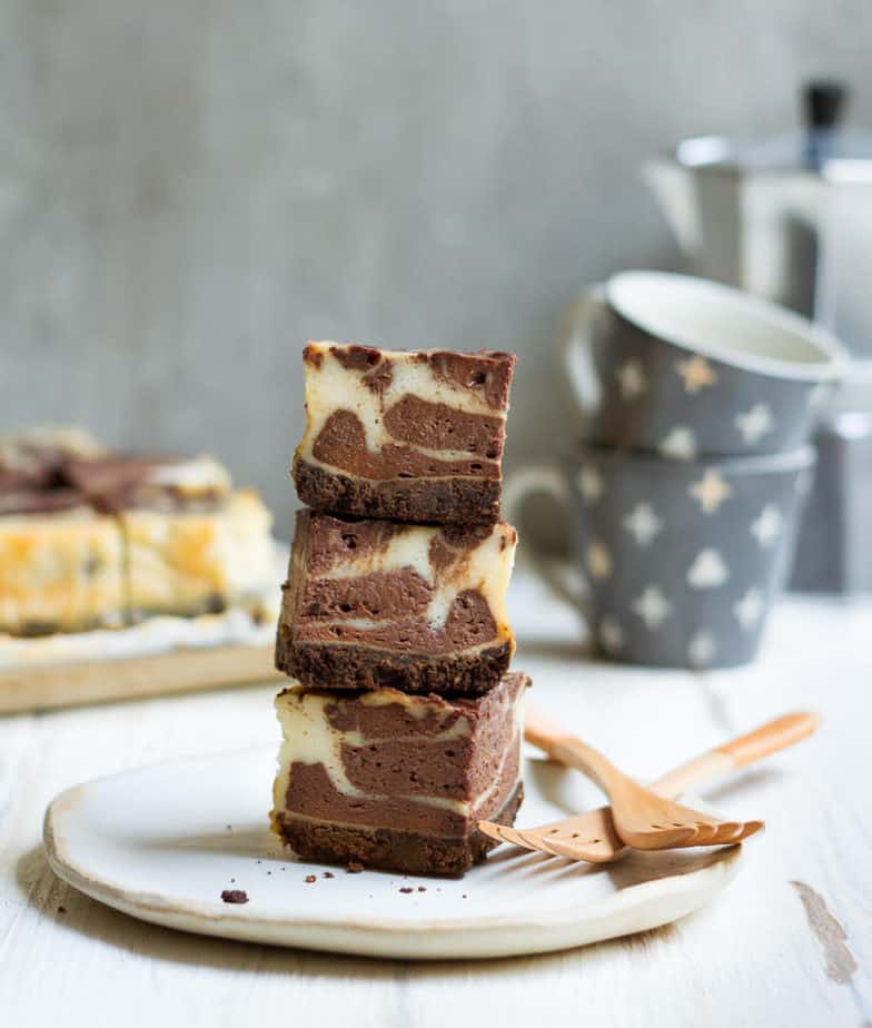 Chocolate Swirl Cheesecake Bars | Easy Chocolate Swirl Baked Cheesecake Bars served with coffee