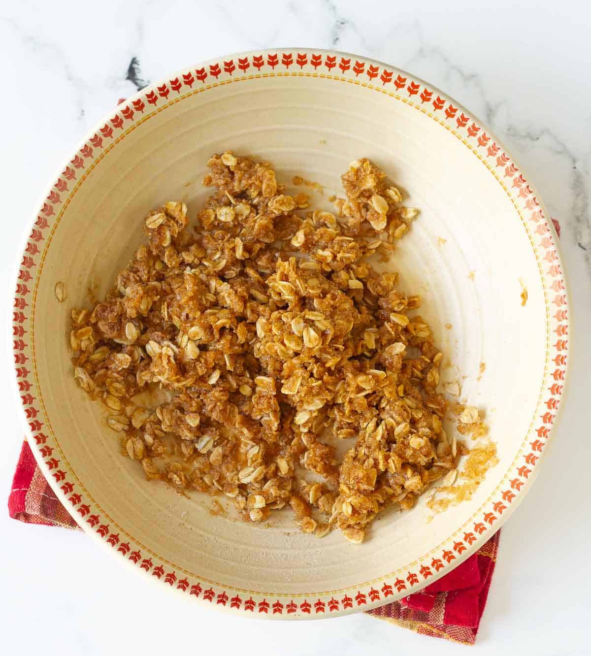 Oats-peanut butter streusel in a bowl.