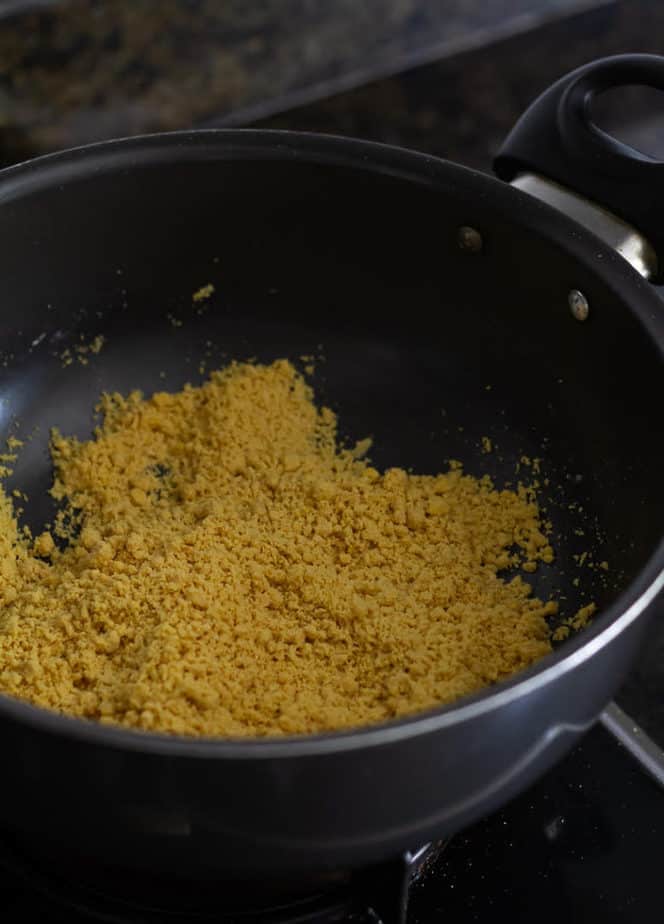 Roasting besan ( chickpea flour) in ghee