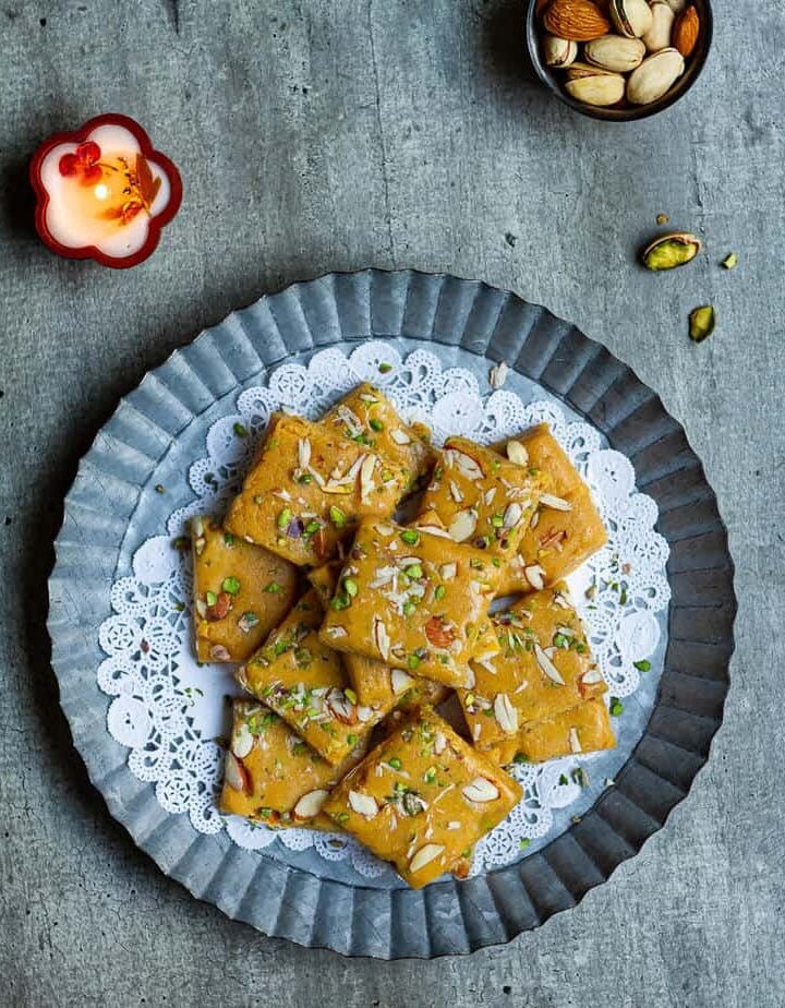 Besan Burfi with Condensed Milk on a serving platter.
