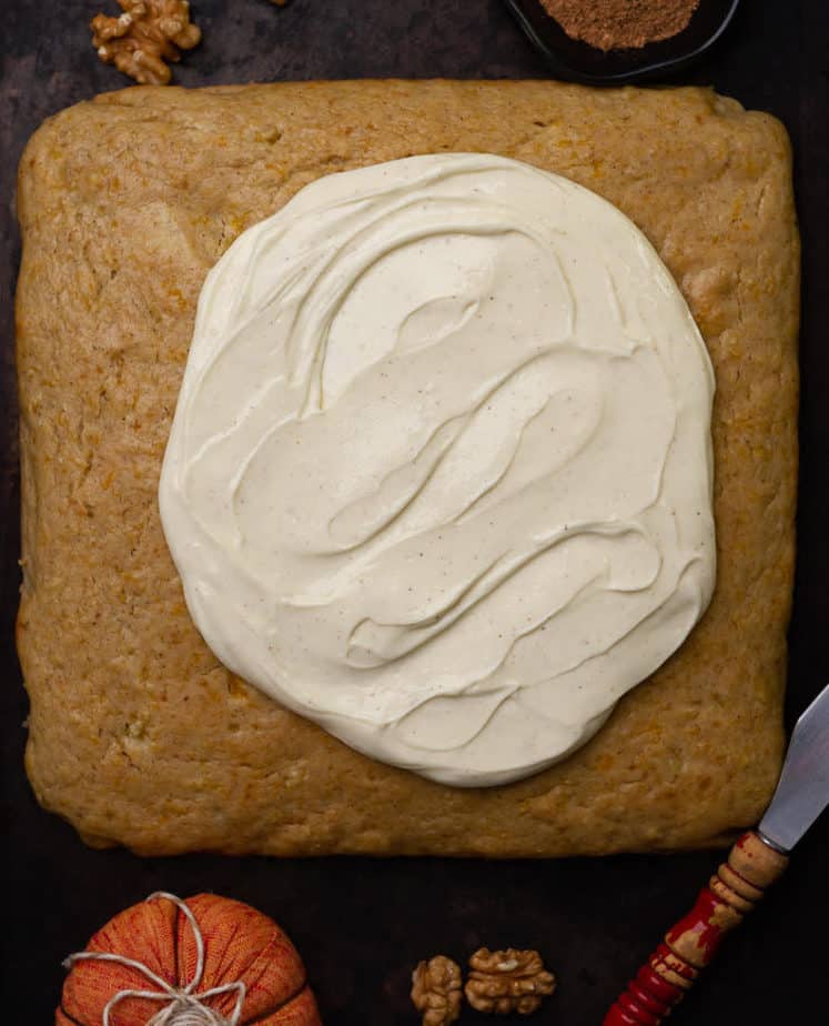 Slather the cake with pumpkin spiced cream cheese frosting