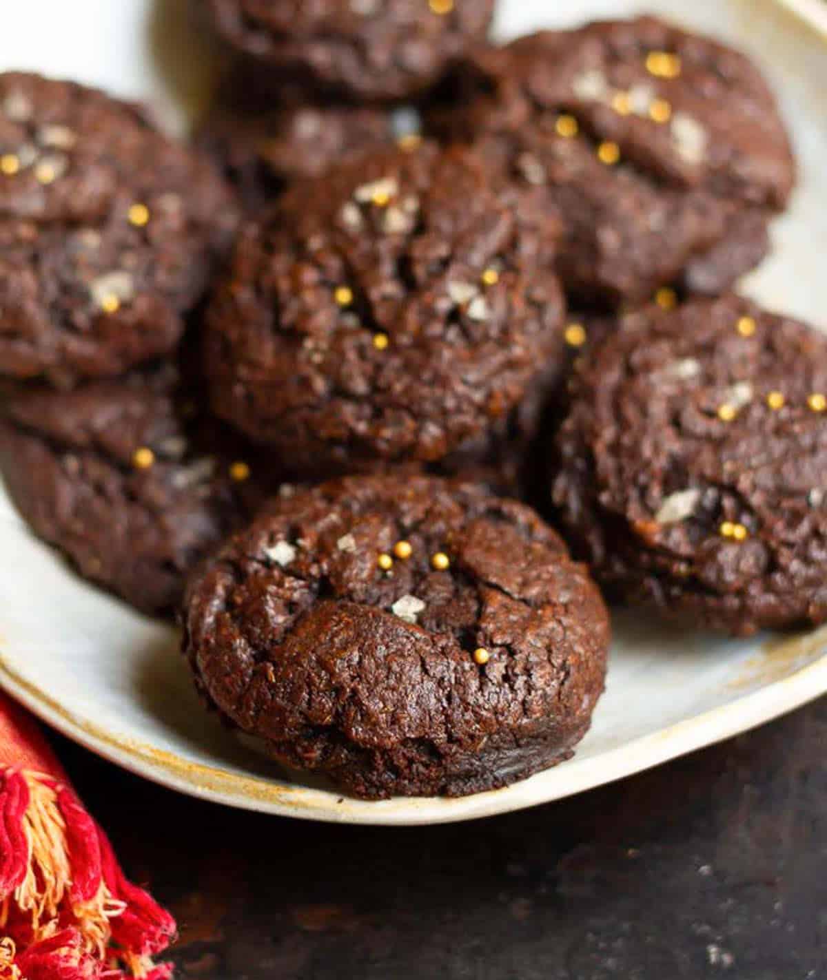 brownie cookies on a platter to show the crackly top.