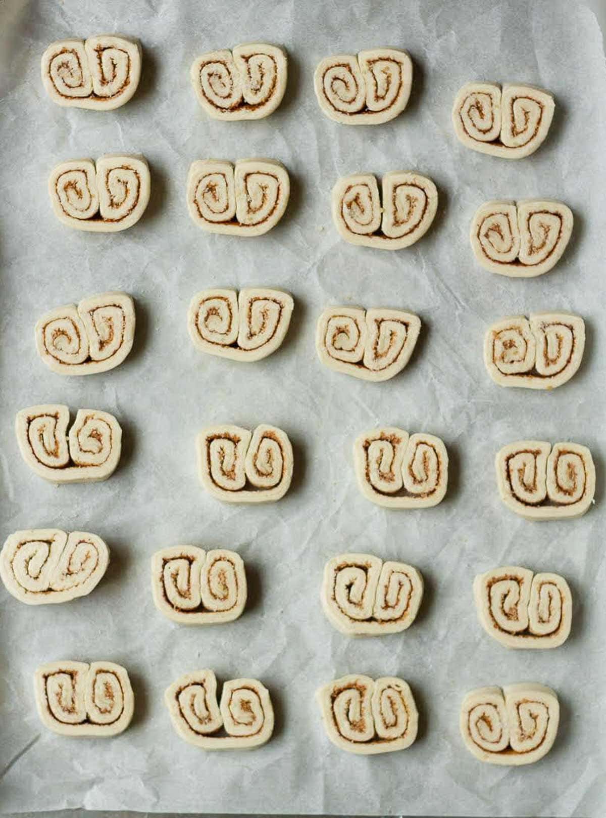 sliced cookie dough on a baking tray.