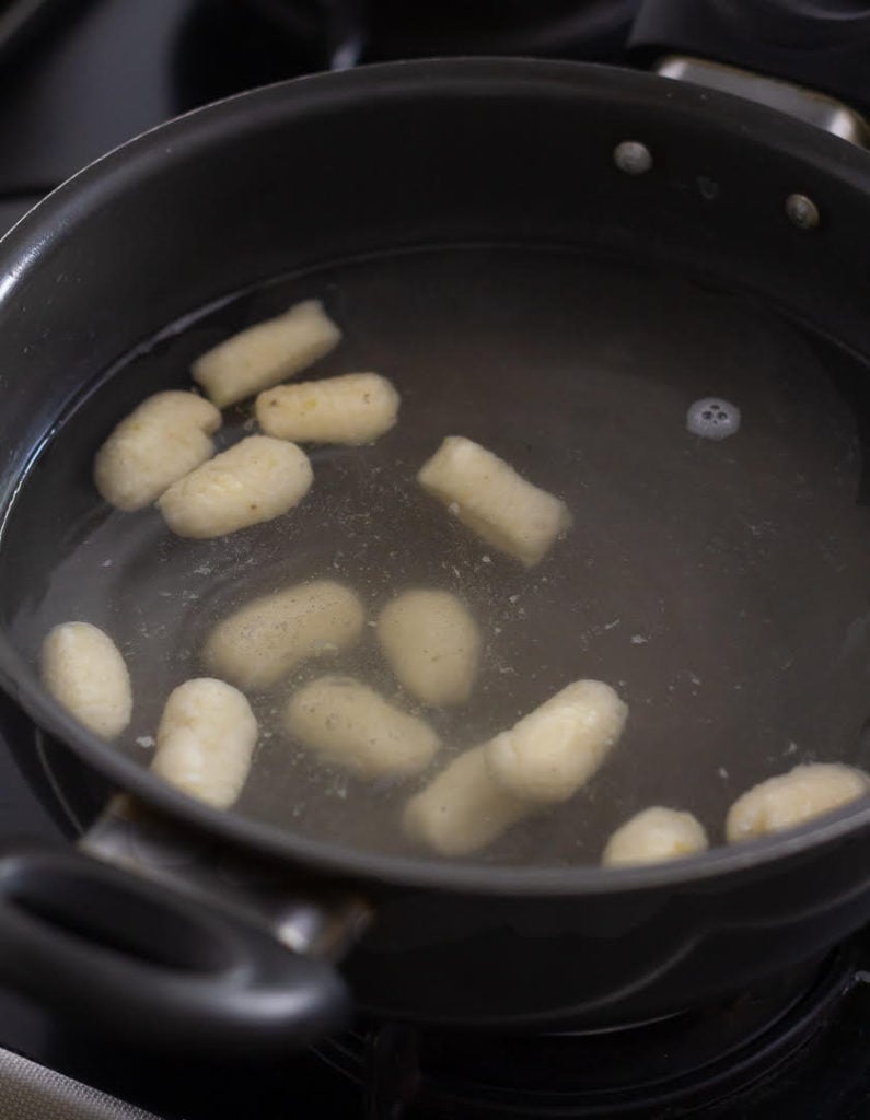 Cooking the gnocchi in salted boiling water