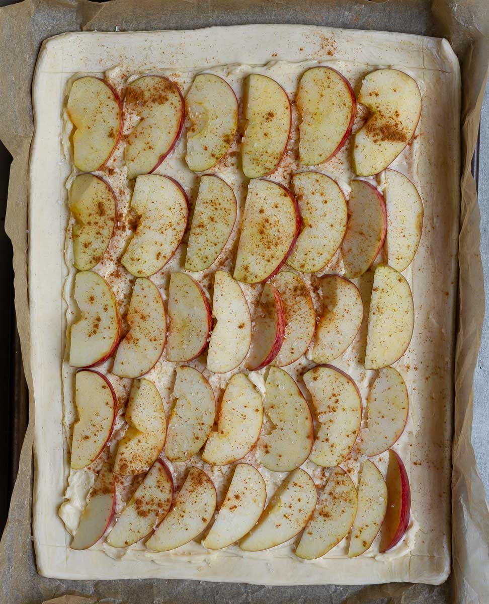 Spread cream cheese and top with apple slices