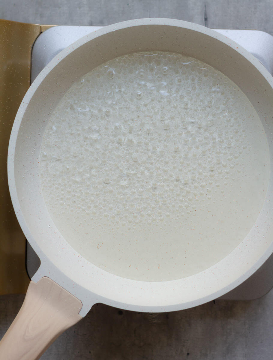Boil water and sugar until you get a one-string consistency
