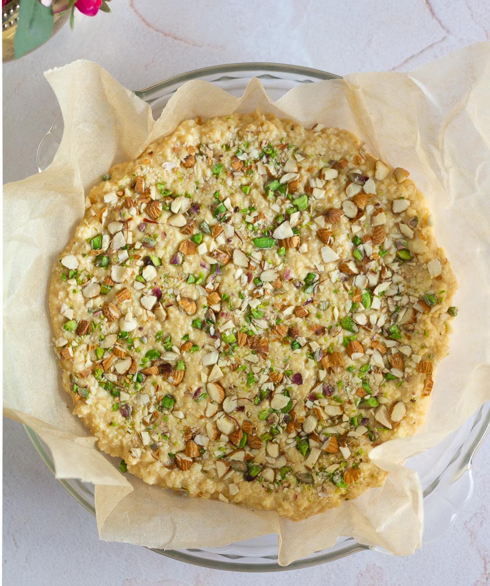 Pour into the prepared pan and top with nuts