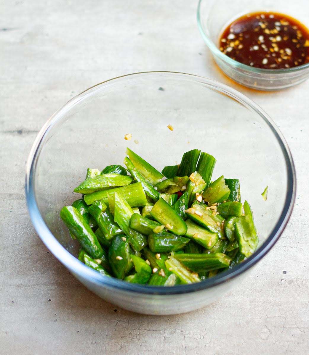 Mix the smashed cucumbers with the dressing