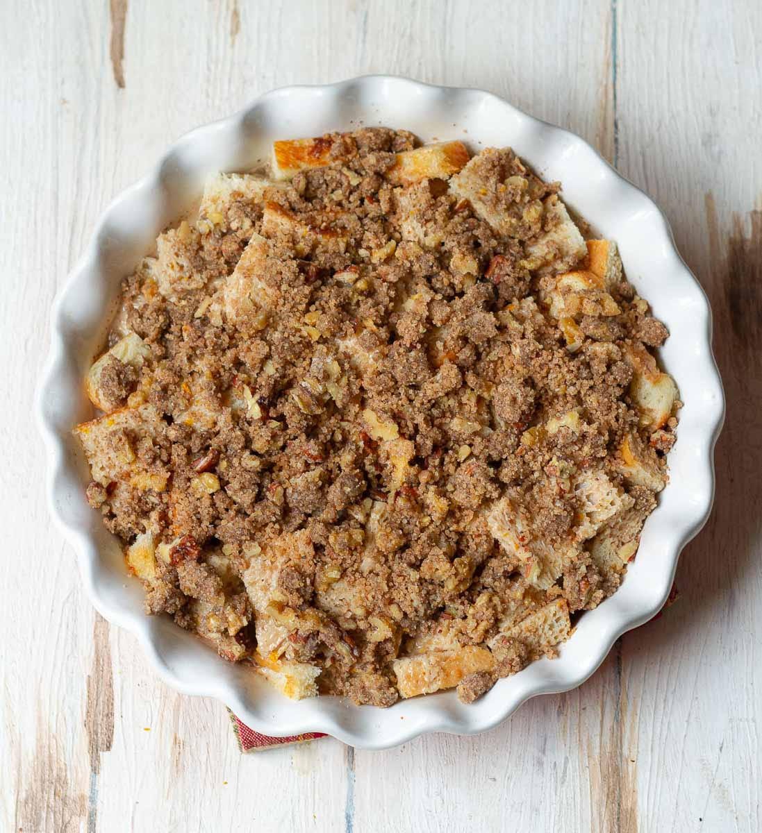 Scatter the topping over the soaked bread