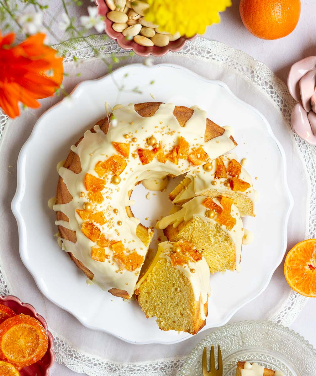  Whole Orange Cake with white chocolate glaze and candied oranges and sprinkles 