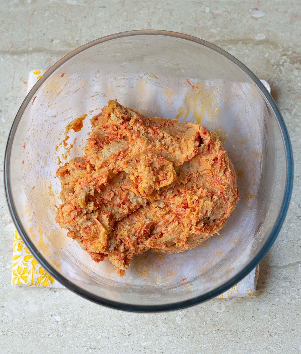 Ready carrot cookie dough in a bowl