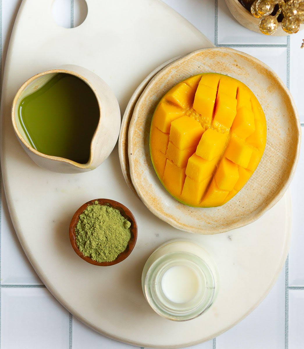 Ingredients for mango matcha latte.