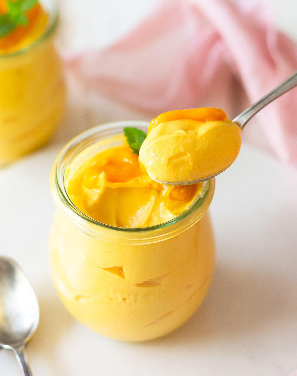 spooning out Mango Mousse 