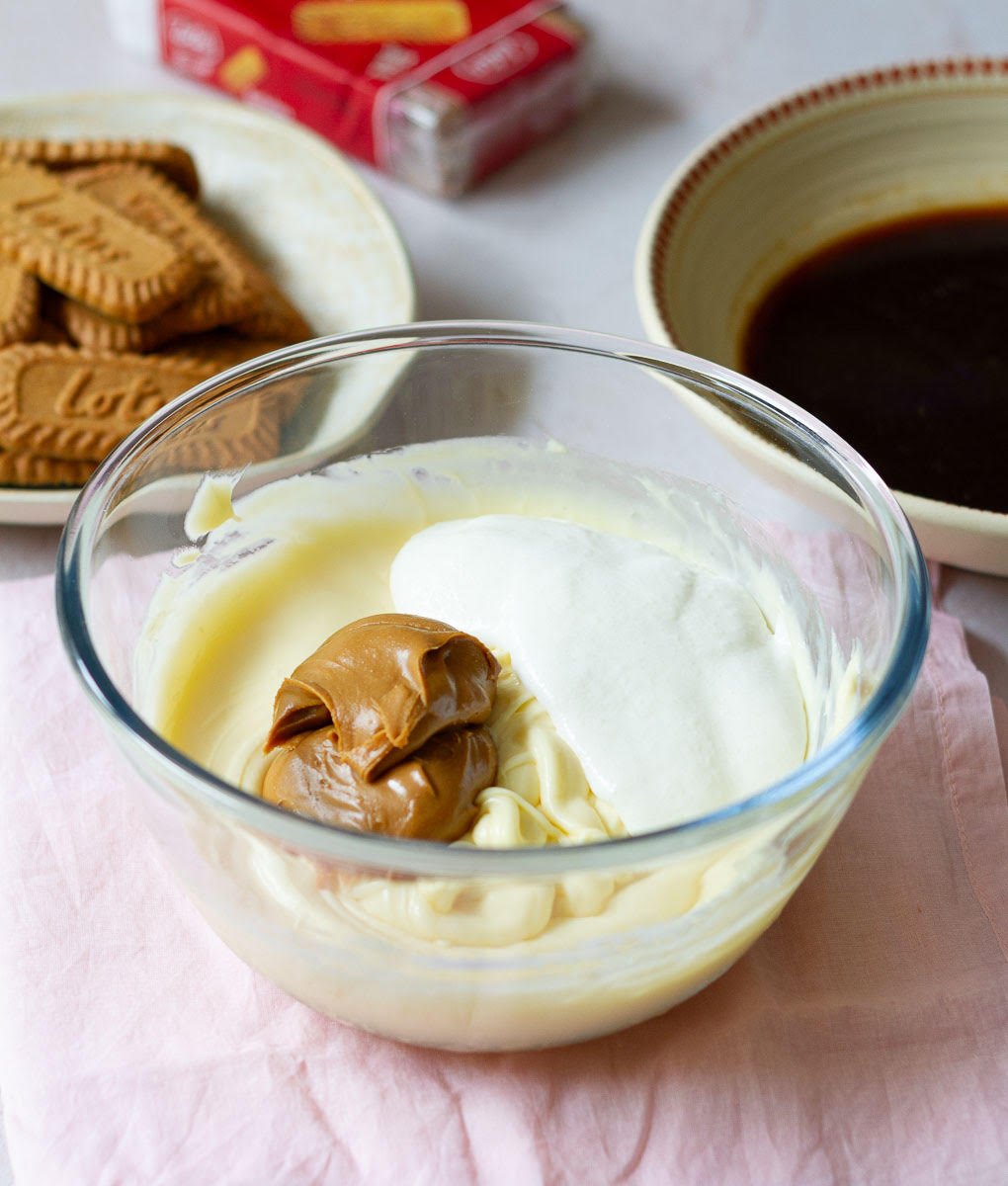 Add Biscoff spread and whipping cream to the mascarpone cheese