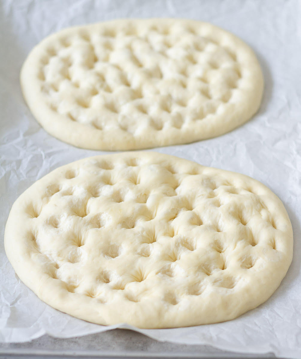 Make indents in the dough with your fingertips