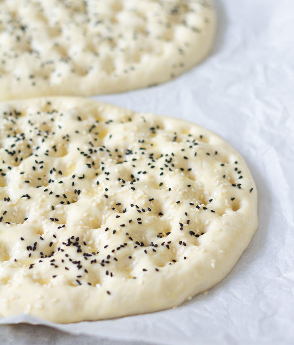 Brush with egg wash and sprinkle with seeds before baking