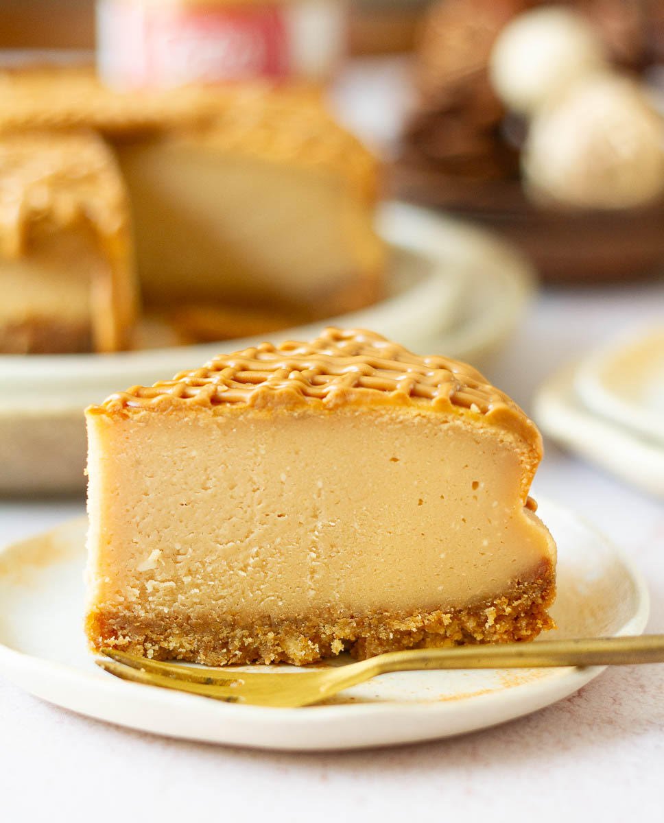 Slice of biscoff cheesecake on a small plate