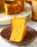 A slice of pumpkin burnt Basque cheesecake on a plate.