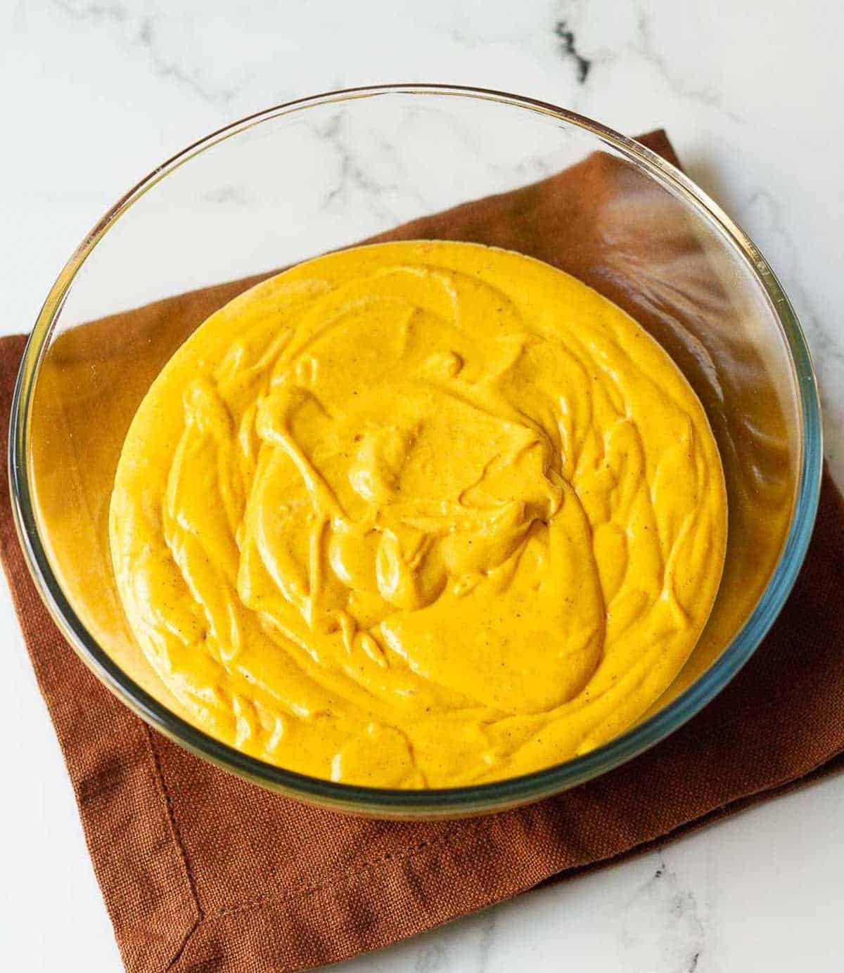 cheesecake batter in a mixing bowl.