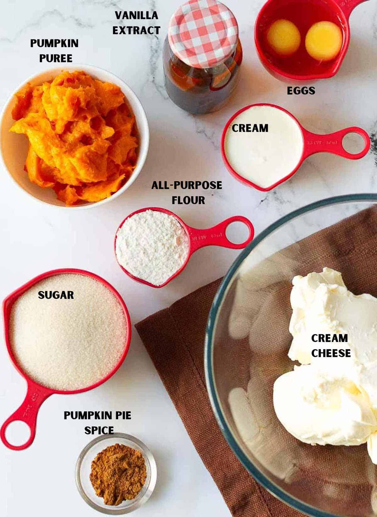 Ingredients for making pumpkin basque cheesecake.