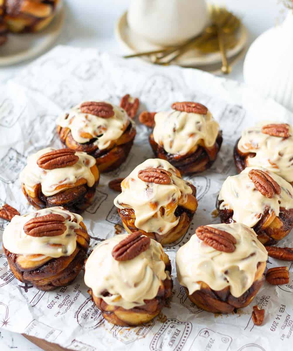 t Coffee Cinnamon Rolls with coffee cream cheese frosting and pecans on top