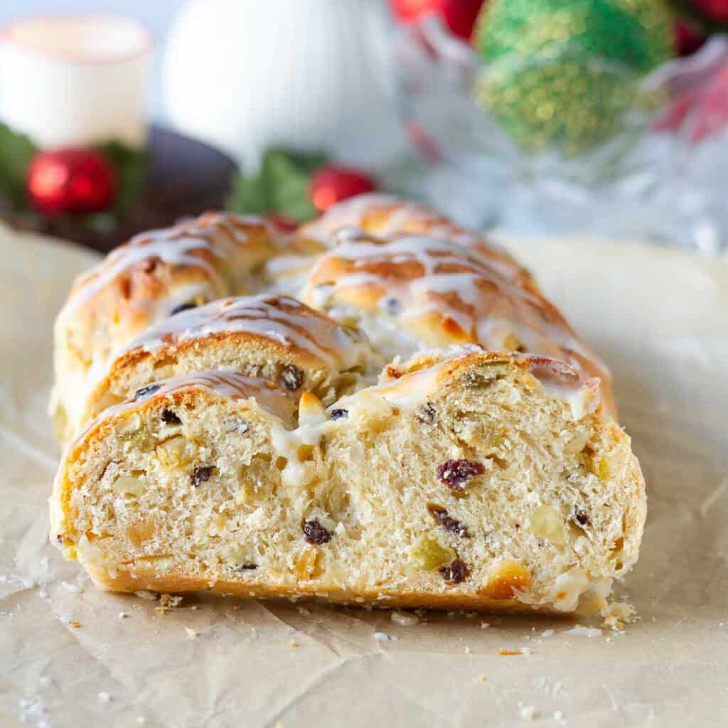 sliced stollen bread on parchment paper.