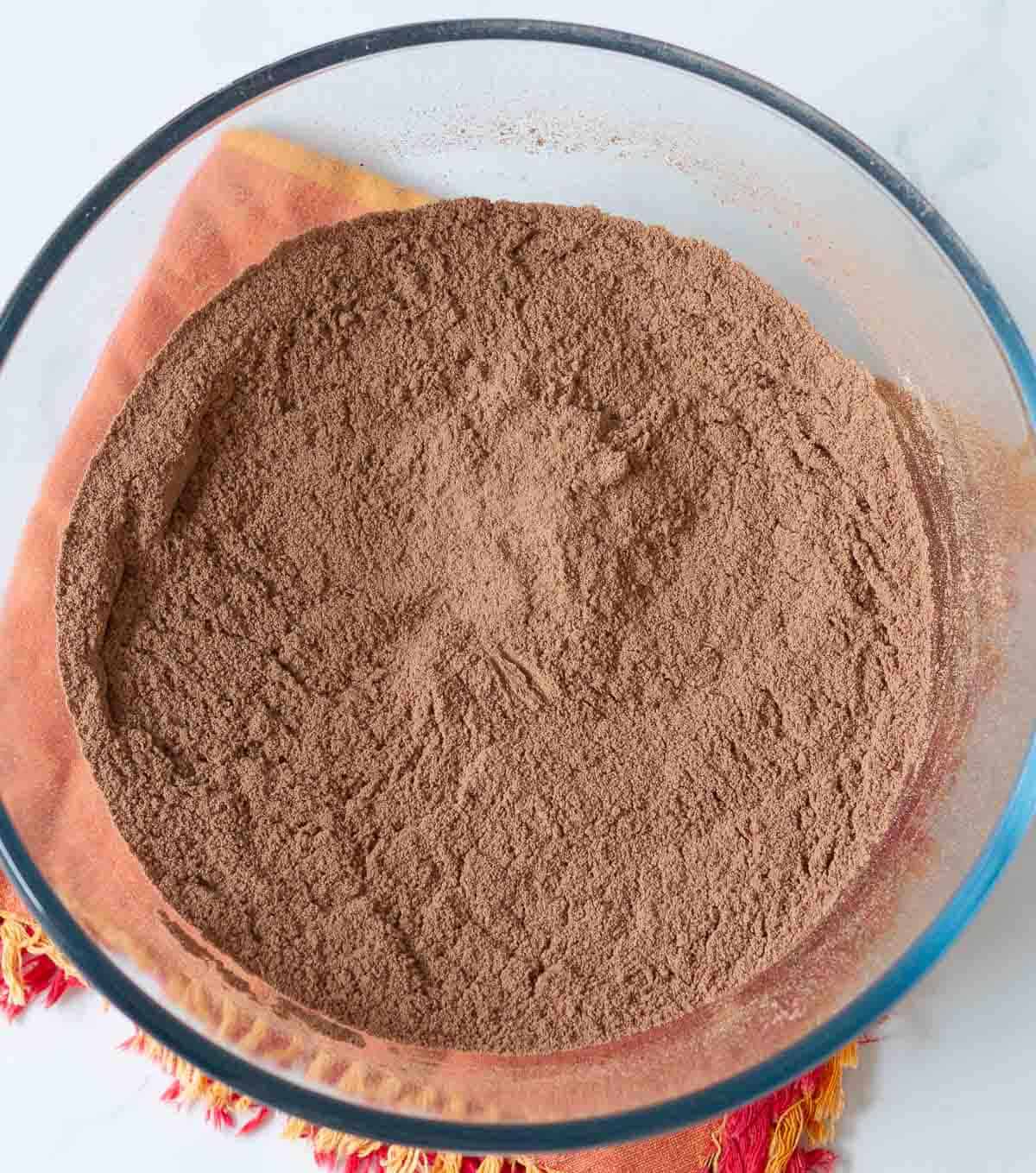 Dry ingredients for cake in a mixing bowl.