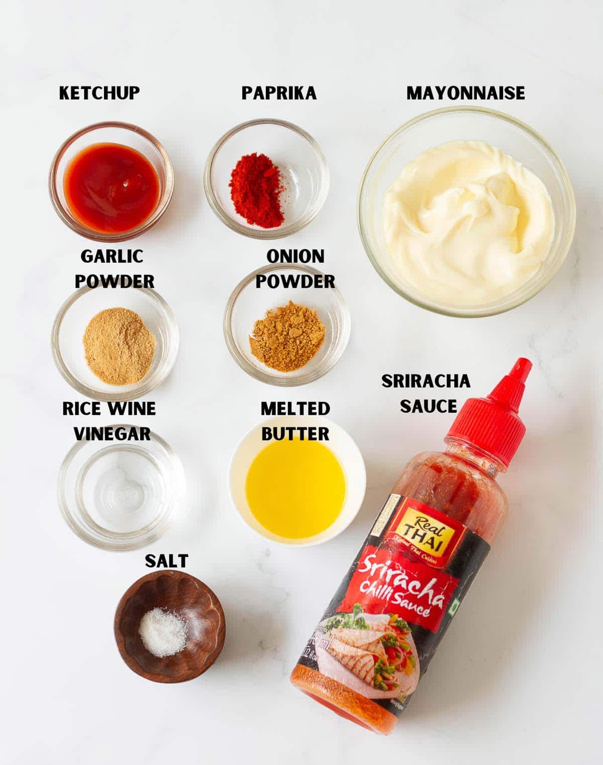 Labelled ingredients for making yum yum sauce.