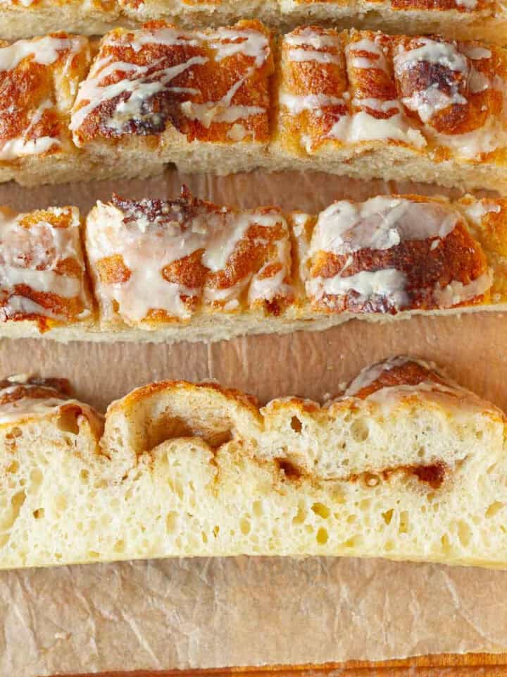Sliced cinnamon focaccia with vanilla glaze.