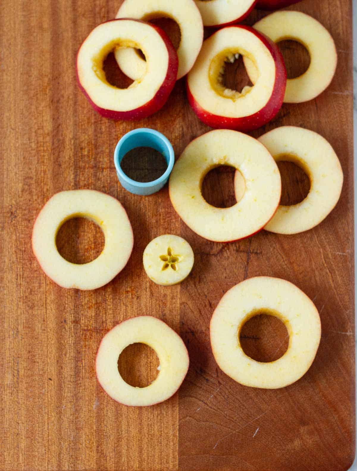 Apple rings with core cut out and a cookie cutter.