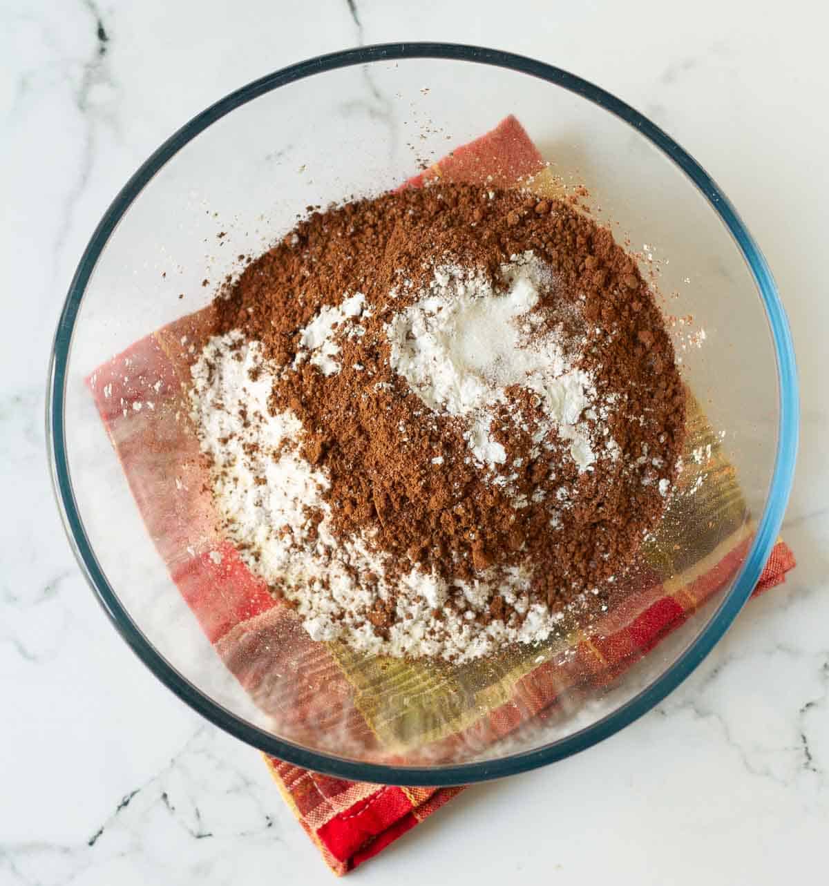 Dry ingredients for hot cocoa in a mixing bowl.